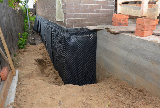 Happy homeowners after waterproofing job in Lenni